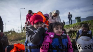 A Syrian refugee and her child cry after their arrival from Turkey on the southeastern island of Lesbos, Sunday, Feb. 28, 2016. Greece is mired in a full-blown diplomatic dispute with some EU countries over their border slowdowns and closures. Those border moves have left Greece and the migrants caught between an increasingly fractious Europe, where several countries are reluctant to accept more asylum-seekers, and Turkey, which has appeared unwilling or unable to staunch the torrent of people leaving in barely seaworthy smuggling boats for Greek islands.  (AP Photo/Manu Brabo)