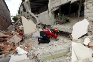 A fireman works after an earthquake struck off Ecuador's Pacific coast, at Tarqui neighborhood in Manta April 17, 2016. REUTERS/Guillermo Granja